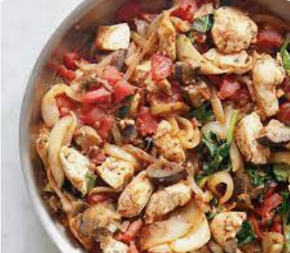 Pollo con berenjena y espinacas.